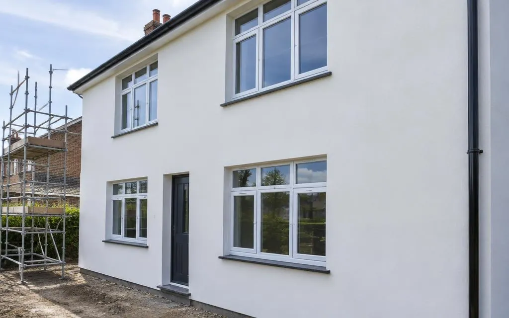 Freshly rendered exterior wall of a house